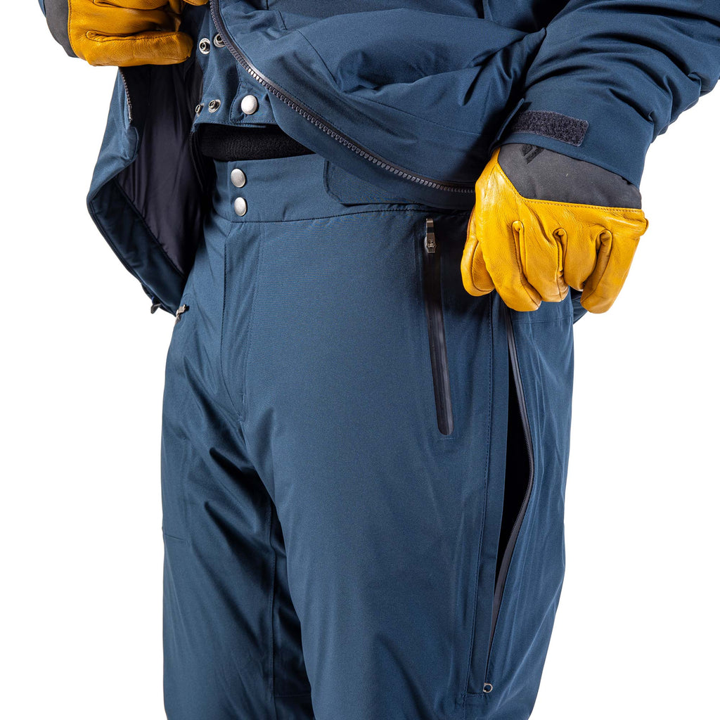 Men's Ezo Insulated Pant in Dark Navy, side view close up of thigh vent